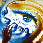 Full color sand painting decorative art of a human eye in vibrant colors