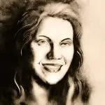 Self-portrait of sand animation artist Daria Tym creating her signature dynamic sand art performance.